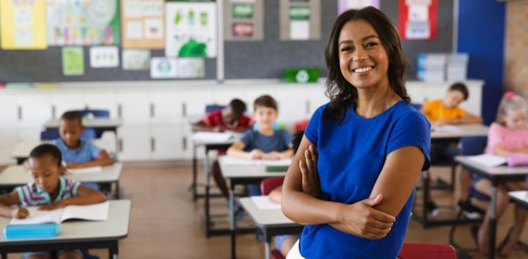 A Teacher Standing in Class room